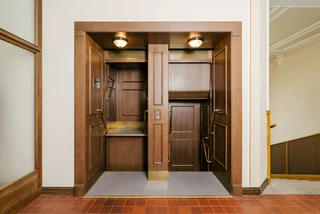 Prague City Hall's paternoster elevator reopens as a guided tourist attraction