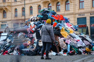 Prague piles up clothes outside shopping mall to highlight fast-fashion crisis